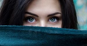 Shy women showing only eyes